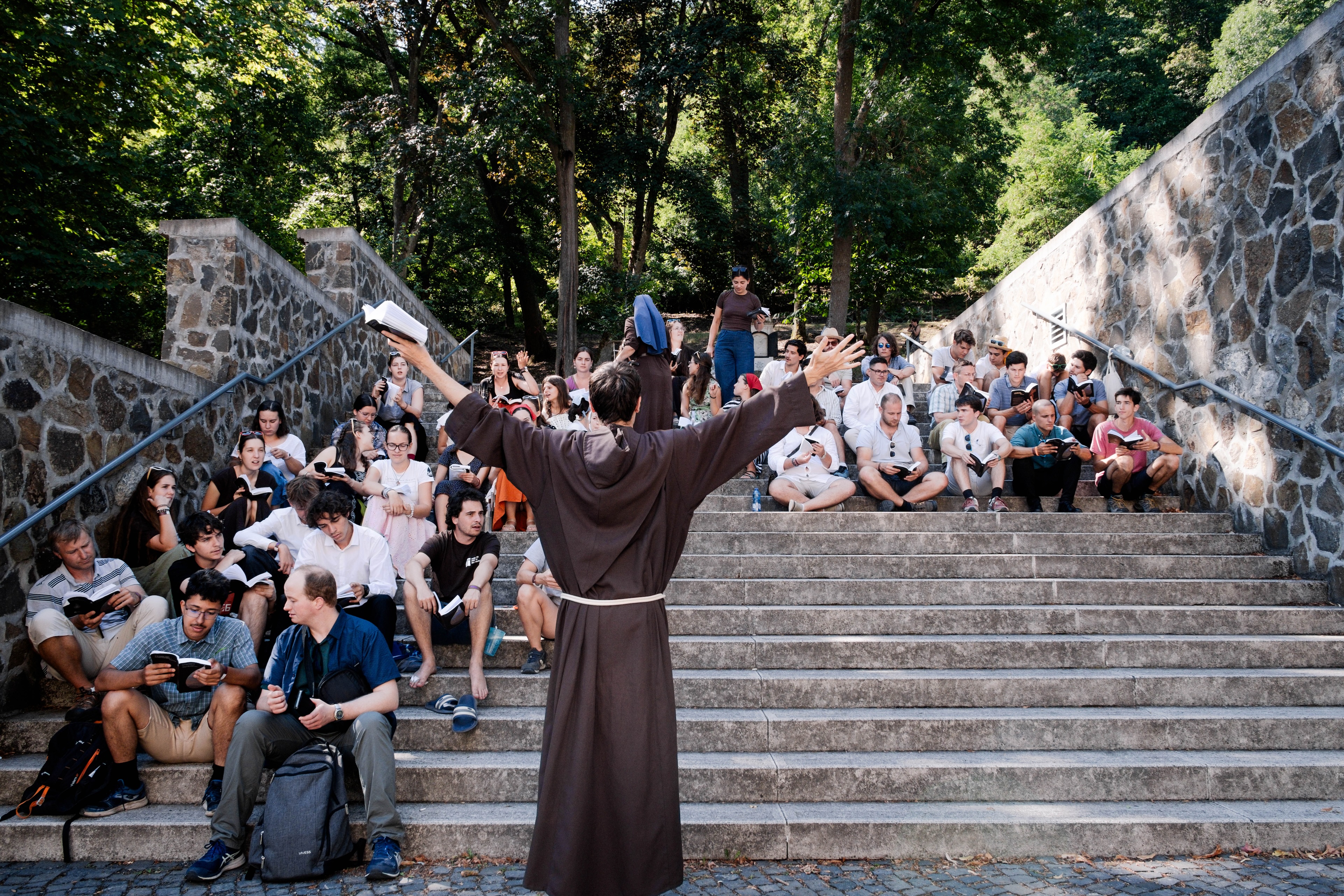 Franciscan friar standing in front of chorus